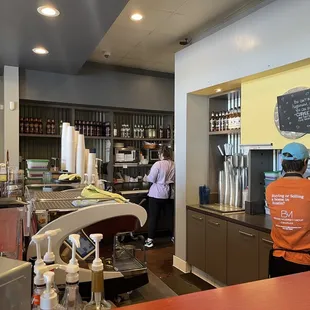 a man working in a coffee shop