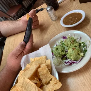 Guacamole, chips and Mexican Coke. Yummy! Highly recommend and this isn't even the main meal!