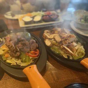 two plates of food being cooked