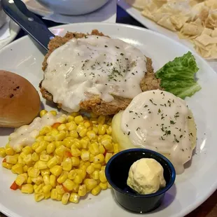 Chicken fried steak, garlic mashed potatoes and corn