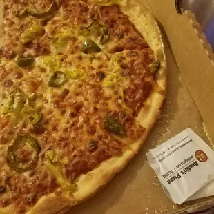 Burnt and very thin. Almost like it was made yesterday. Delivery was prompt