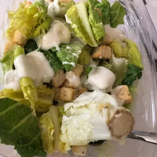 The BUTT END of the romaine head was IN THE SALAD!  It was half yellow. Went in the trash.