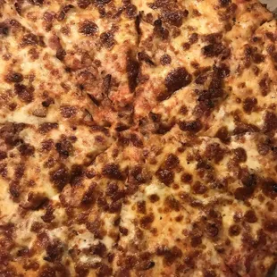 Austin's burnt pizza. Who boxes this thinking someone who paid top dollar is going to enjoy it?