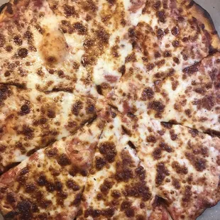 Austin's burnt pizza. Who boxes this thinking someone who paid top dollar is going to enjoy it?