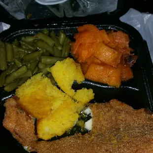 Cornbread, candied yams, fried filet fish, and string beans! Yum yum