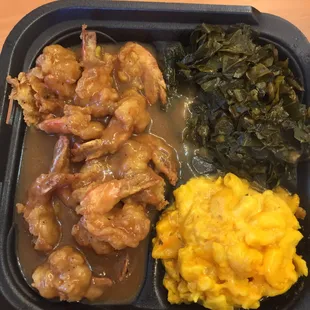 About lunch today! Smothered shrimp, Mac n cheese and collard greens. What a great treat for my cheat day!