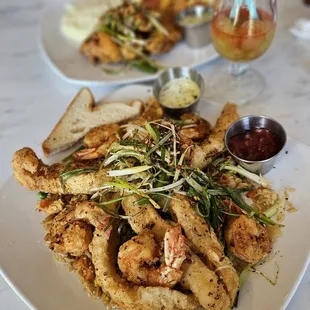 Salt and Pepper Combo plate with catfish fish over fried rice