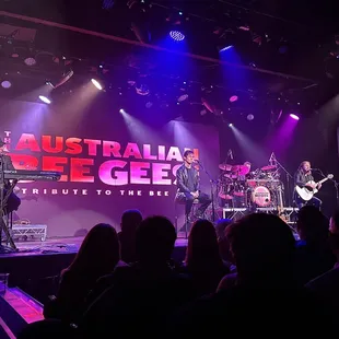 a band performing on stage