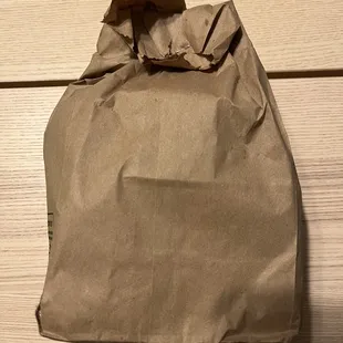 Delivered from Yelp/ Grubhub in a brown paper bag :)