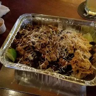 Mookie's ultimate bowl with mojo pork, chicken and beef. Wonderful.