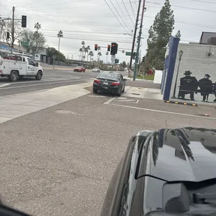 One of the workers cars parks at the front of the entrance