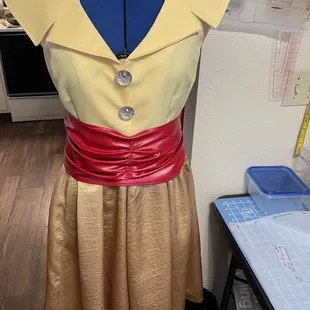 Buttons and cummerbund pinned to see what it will look like.