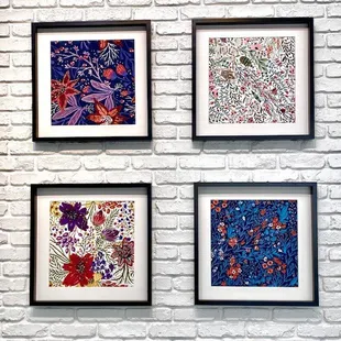Anita Goodesign's "Secret Garden" pattern options framed.