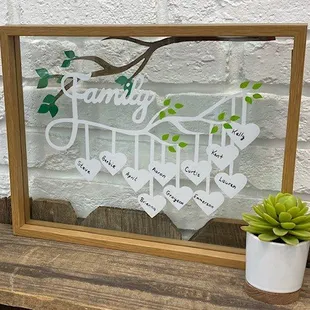 Family tree in a floating frame made with adhesive vinyl.
