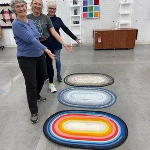 Happy students with their jelly roll rug creations!