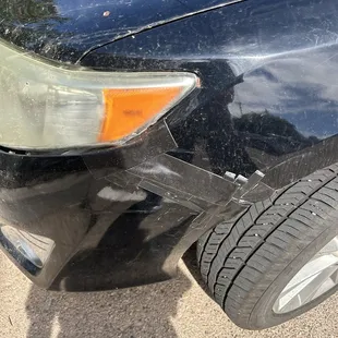 Old bumper was hanging on there by duck tape and zip ties