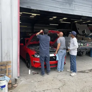 Guys working on the 2018 Mustang GT.