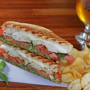 Chicken pesto panini with mozzarella and tomatoes