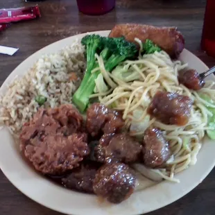 My plate with vegetable fried rice, beef &amp; broccoli, lo mein, egg foo young, and sweet &amp; sour pork. Note: plates are about 10&quot;.