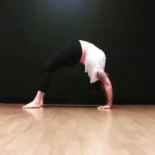 Owner practicing Urdhva Dhanurasana or  wheel pose 2021