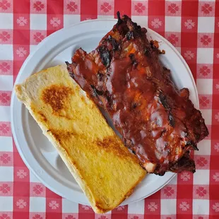 Half Slab BBQ ribs w/ garlic bread