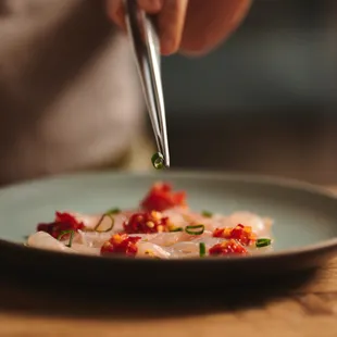 a plate of food being prepared