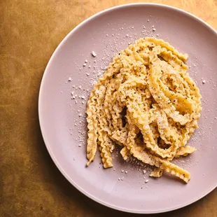 a plate of pasta on a table