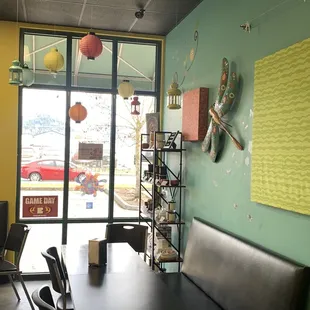 a table and chairs in a restaurant