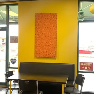 a table and chairs in a restaurant