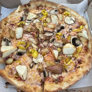 Custom made: potatoes, vegan cheese, banana peppers, shrooms