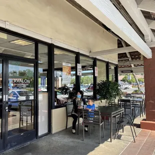 Plenty of outdoor seating on both sides of entrance.