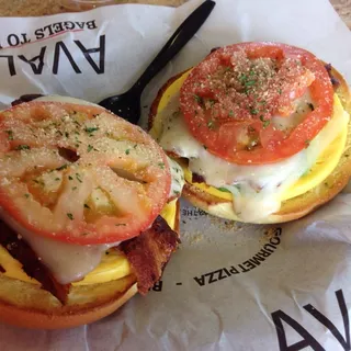 Egg, Jack, Avocado & Tomato Melt on Egg Bagel