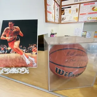a basketball in a clear box