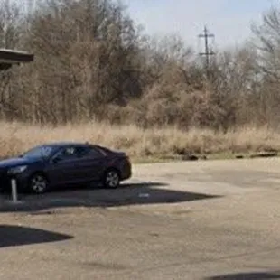view of store building and gasoline pump area of Avalon Market