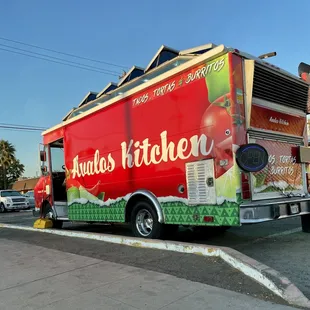 a food truck parked on the side of the road