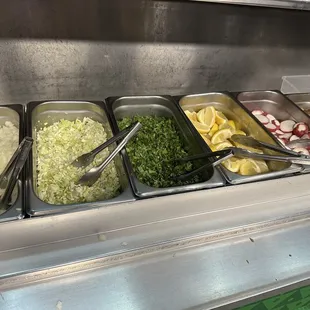 bar area where you can add whatever toppings to your food!
