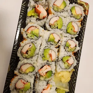 a plate of avocado sushi