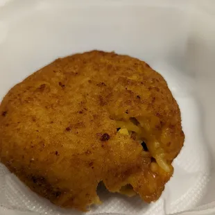 a piece of food in a plastic container