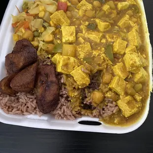Tofu curry with cabbage rice and peas and plantains