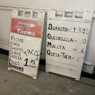 two signs on the side of a truck