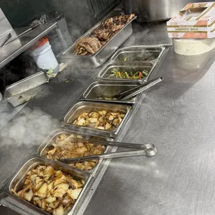 Free sides, grilled onions and grilled Serrano peppers