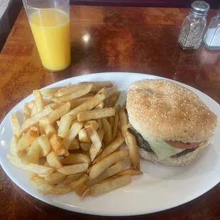 Cheese Burger Deluxe with a side of French Fries