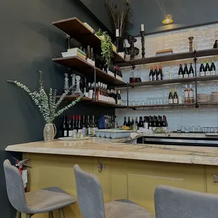 a bar with a lot of bottles of wine