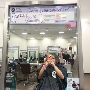 This is me sitting in the chair at Aveda waiting for Crystal to do my hair. I was having a scalp treatment and a haircut with a blowout.