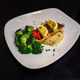 Grilled Salmon B.B.Q.: Lemon caper sauce, rice and broccoli