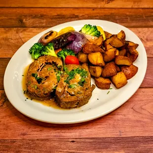 Homemade Italian Meatloaf: Topped with demi glazed sauce, roasted potato &amp; vegetables