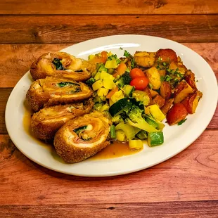 Italian Stuffed Chicken: With fresh spinach, ham &amp; cheese, sautéed in sweet marsala sauce with roasted potato &amp; vegetable.