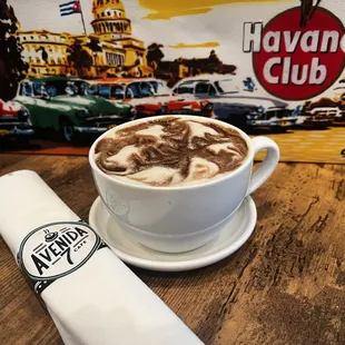 Savor a moment of Cuban charm with our signature cappuccino at Avenida 7 Café, Philadelphia.