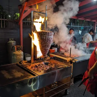 a grill with smoke coming out of it