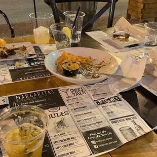 a table full of food and drinks